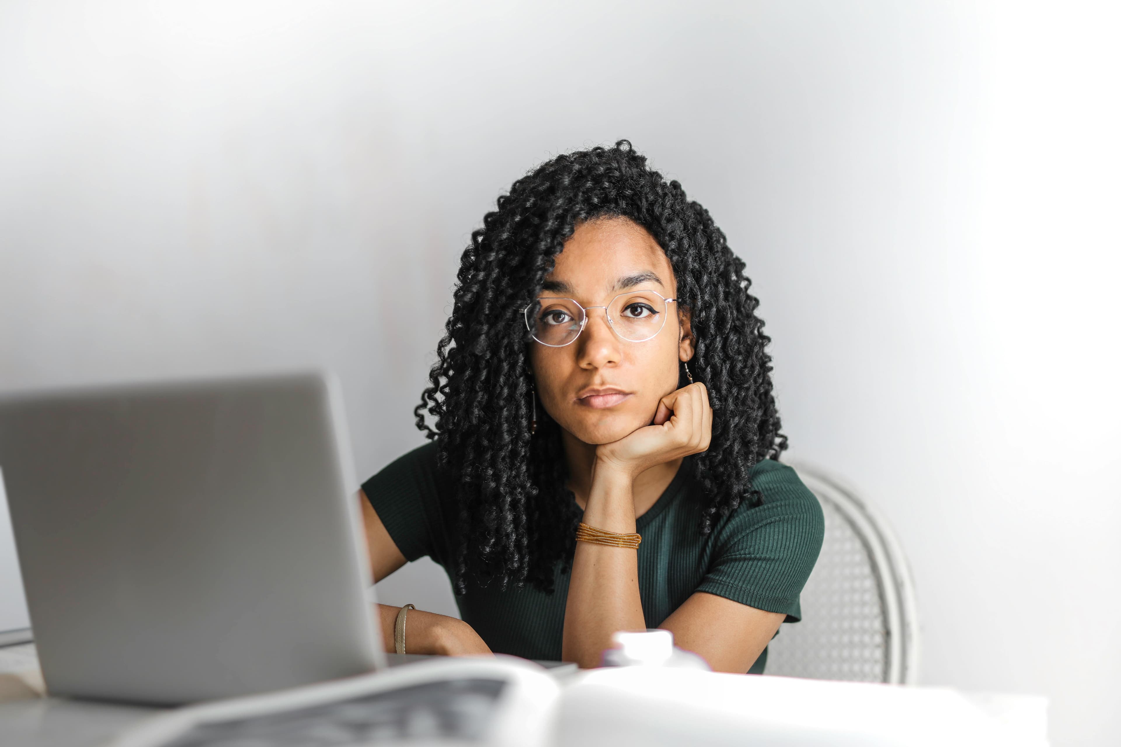 Professional woman using a laptop at work